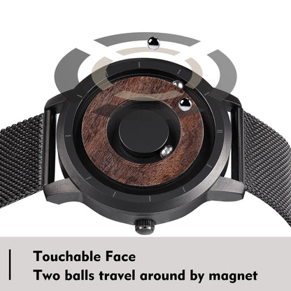 close-up of magnetic ball bearings on wooden watch dial