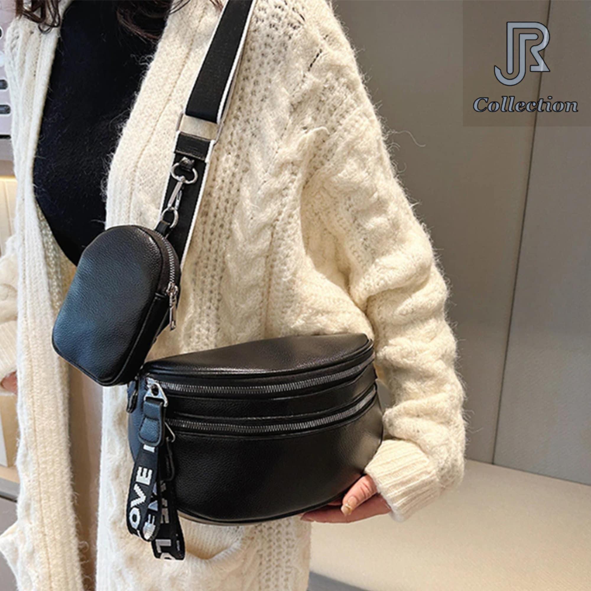model wearing women’s leather shoulder crossbody bag